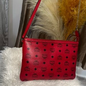 Mcm wristlet with added chain for shoulder bag